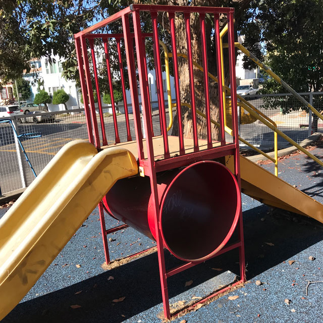 Franklin Elementary's current playspaces with tot lot slide